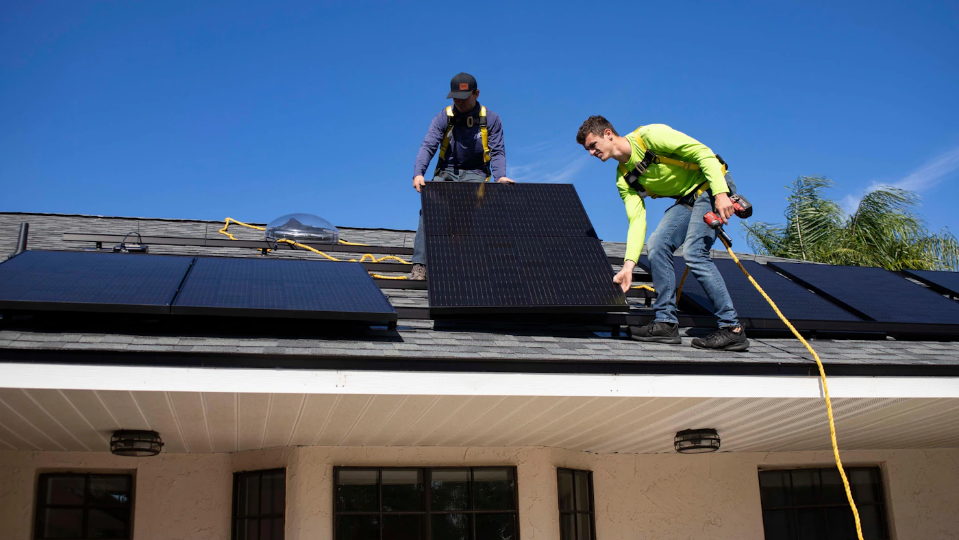 Esteem Energy installers completing a solar installation