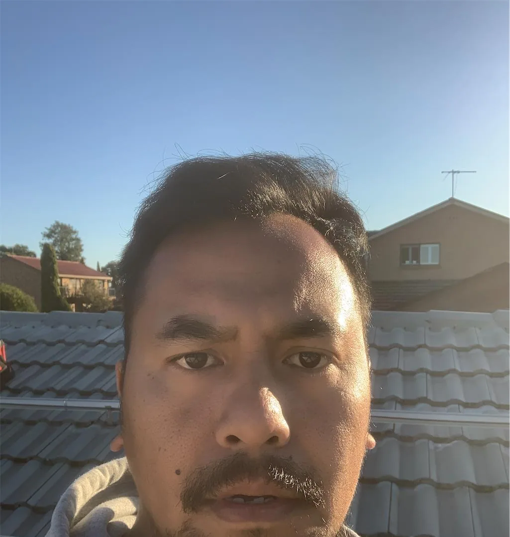 Solar installation worker on site beside residential solar panels, project photo 61